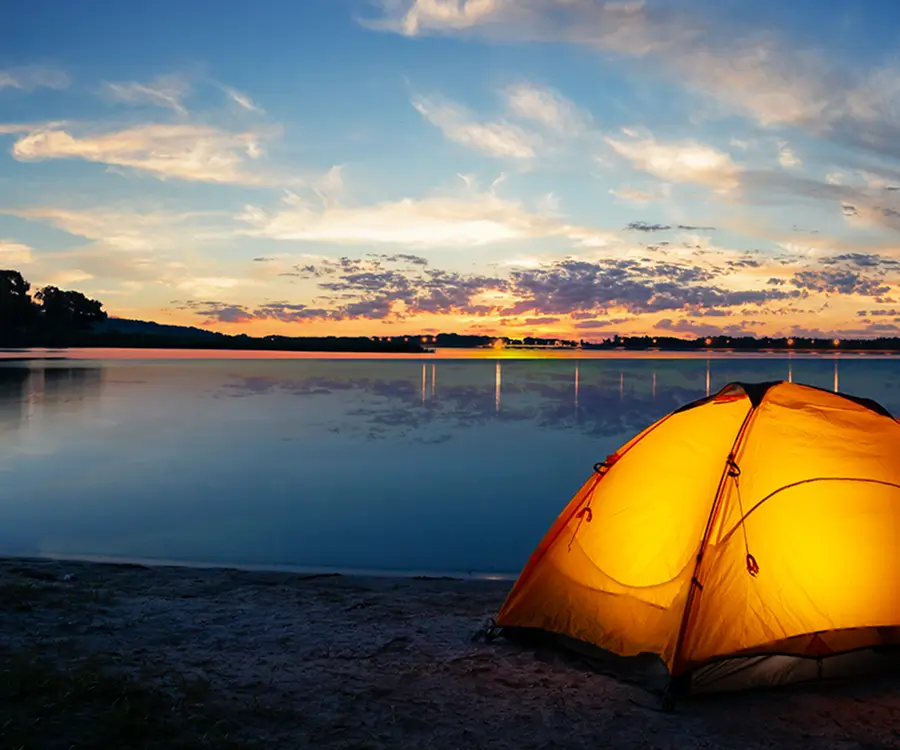 orange-tourist-lit-tent-by-lake-sunset 1 (1)
